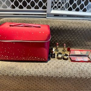Estée Lauder train case with skincare and makeup